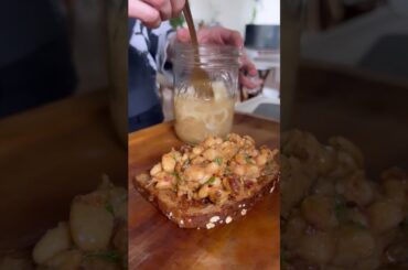 Easy, delicious white beans w/ sun dried tomato, chili onion crunch, basil & aged balsamic vinegar