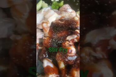 Chicken Wings with lemongrass, garlic, white onion, chili, cilantro, green onion, ginger stir fry