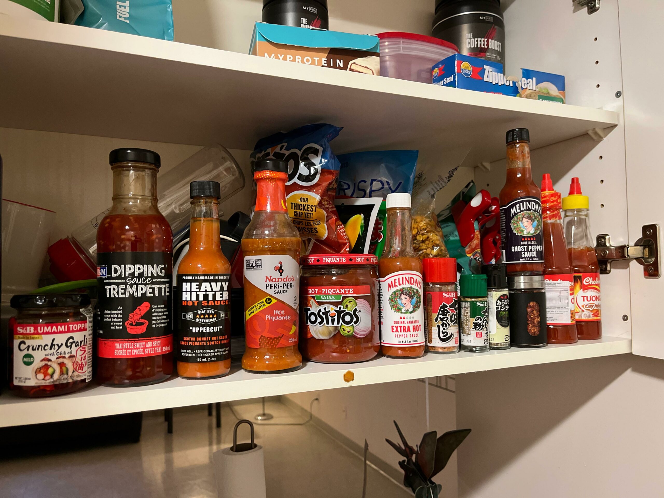My collection of spicy sauces/chili powder and seasoning/chili oil