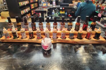 There is a store near me that specializes in hot stuff. Here is some of their sauces. The pictures are big enough that you can zoom in and read the titles. They have a sauce that is called "Knock Knock"...