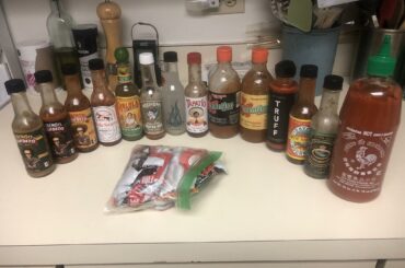 my hot sauce collection. there was a refrigerator door incident a few days ago and i lost 3 bottles. on the plus side that leaves me room for 3 new bottles. what should i add? (the casualties included orig cholula, el yucateco green and some stuff my buddy made with chilis from his garden)