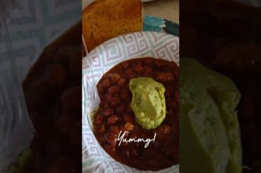 Best Choice chili with beans and guacamole and garlic bread.