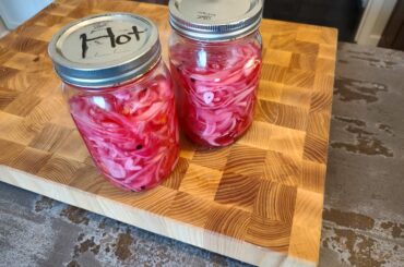 fresh habanero peppers in homemade pickled red onions