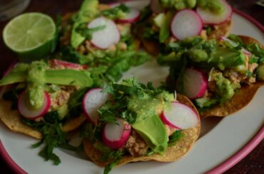 Gringo submission from the UK. Today's lunch: crab tostadas. Brown and white crab meat with lettuce, cucumber, homemade tomatillo salsa, radish slices and avocado (little extra dash of El Yucateo red habanero hot sauce not shown) on crispy baked corn tortillas from Guanajuato, Mexico.