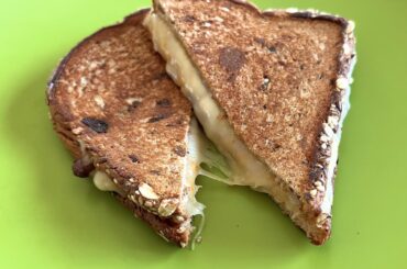 Extra hot grilled cheese sandwich. Whole wheat raisin bread + triple pepper cheese!! See pics.