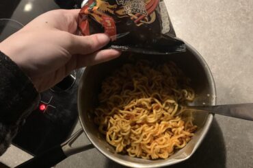 Owwieeee! I survived this scary instant noodle challenge. Lets make it a real challenge with a s**tload of Carolina Reaper hot sauce. I'll let you know if I survive it. Try and ignore the shady ass way I'm eating this.