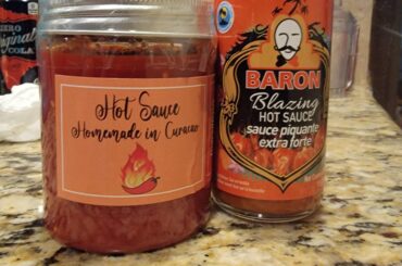 Wife went on a cruise to the Caribbean and I asked her for some hot sauces. Anyone recognize these? The one on the left is definitely homemade.