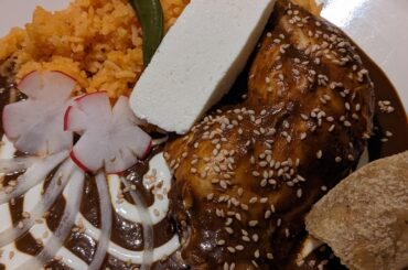 Homemade Mole Poblano with chicken/enmoladas with rice.