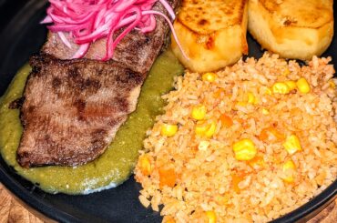 Beef tongue in salsa verde with potatoes and rice
