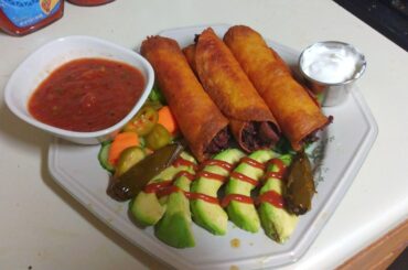 Taquitos Grande - Chicken, cheese, roasted green chiles and onions. Wrapped using HEB "Mixta" tortillas (half flour and half corn - perfect for these)