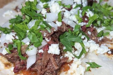 This was amazing. Smoked Barbacoa Taco. Fresh salsa, onion, queso fresco, cilantro.