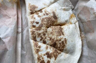 I just added shredded beef to a cheese quesadilla