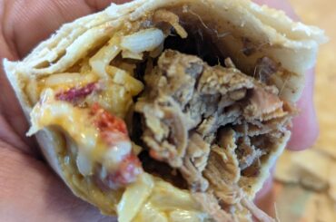 Shredded beefy melt burrito.