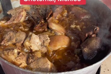 Carnitas bubbling in a street-side cauldron. Yum!