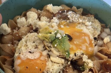 Sunny side eggs on a bed of Mexican soup