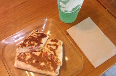 My go to Taco Bell order. 2 chipotle ranch grilled chicken burritos, and a large Mountian Dew Baja Blast.