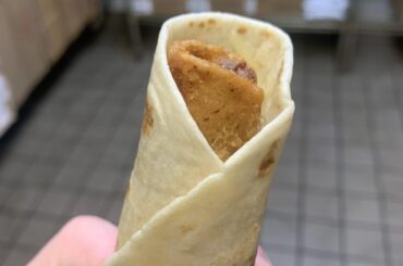 I gently nestled a rolled chicken taco inside a cheesy roll up.