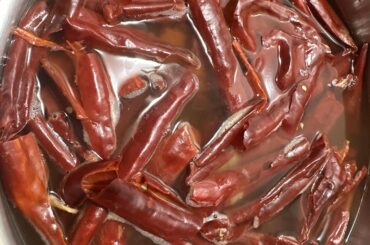 Enchilada Salsa plus serving chips and enchiladas