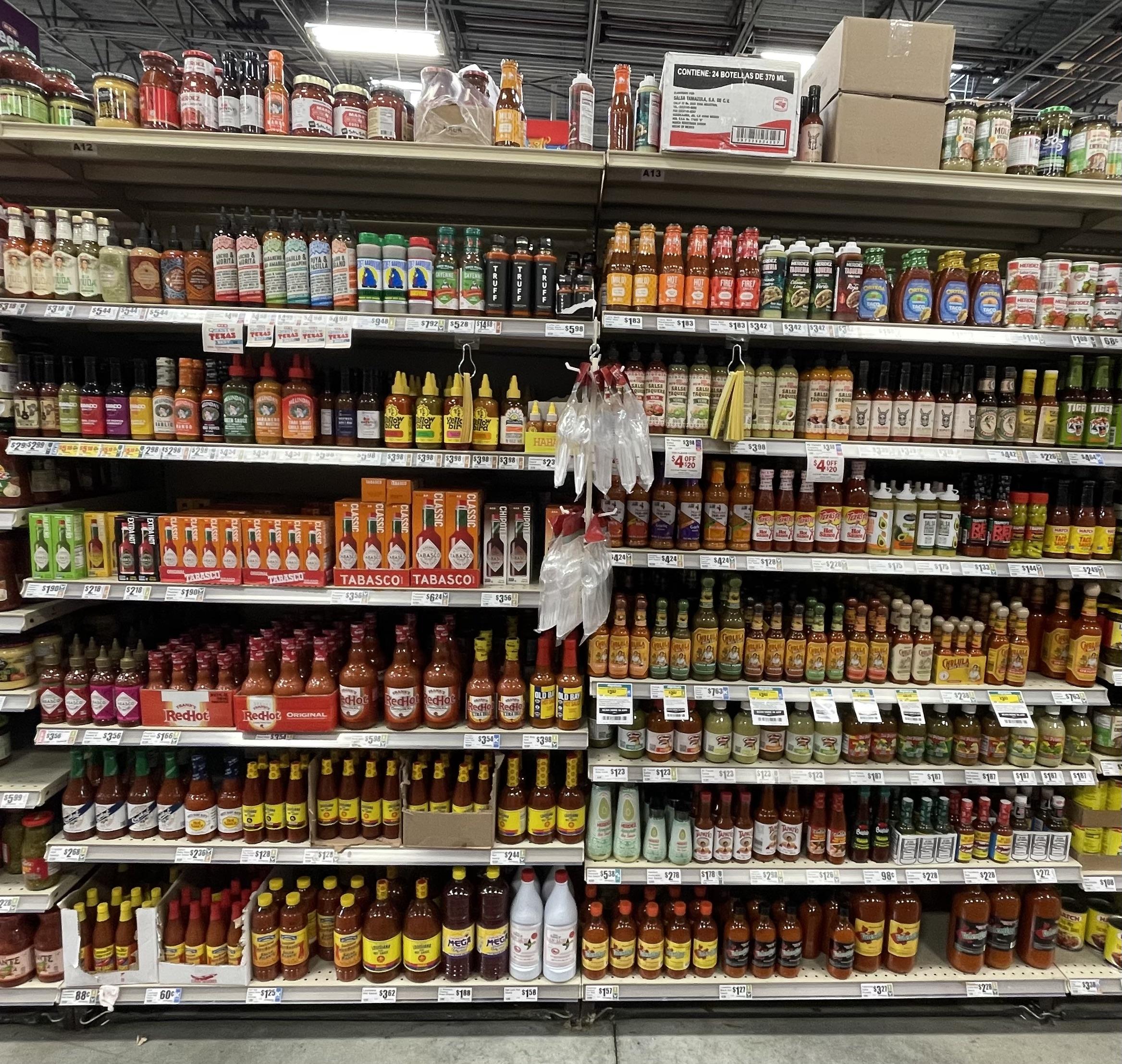 HEB hot sauce isle. I grabbed a few bottles. Chili Chili