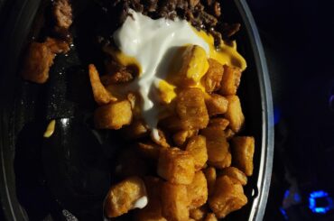 Wanted to try something different! Cheesy Fiesta Potatoes + Extra Potato, Steak, Black Bean, & Red sauce. $4.84!