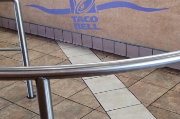 Appreciation: Taco Bell dude casually busting out the arm wave.