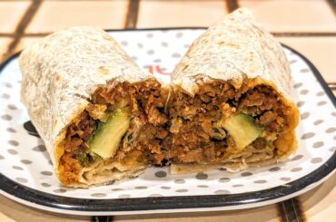 Chicken, potato, tomato, avocado and cheese burrito