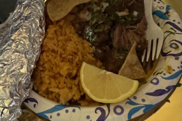 My husband’s birria plate with rice, beans and tortillas.