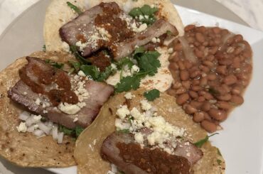 Homemade pork belly tacos with smoked salsa