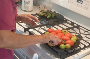 Master Chef(My mom) making the salsa for the pocho side of the family(non spicy)
