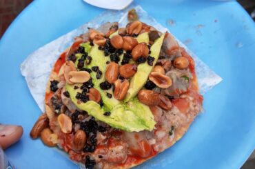 Tostada de Erizo con Almeja (sea urchin w/ clam) from La Guerrerense. Anthony Bourdain once called it "the best street food in the world".