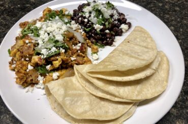 Mexican style eggs with ancho/pasilla sauce
