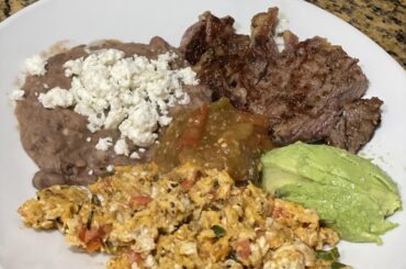 Huevos a la mexicana, added a piece of steak I had left over from last night.