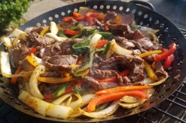 Fajitas on the grill using marinated sirloin flap meat.
