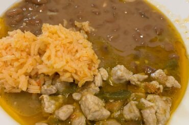 Pork with green chile and rice, beans