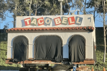 The original Taco Bell building sits behind the companies headquarters in the parking lot