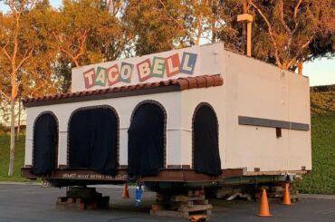 The original Taco Bell building currently sits in a parking lot just behind the company headquarters