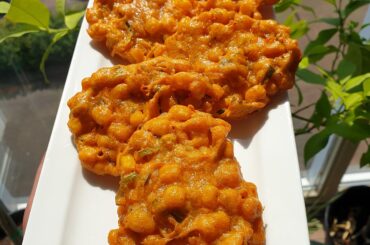 Tod Man Khao Pod (Thai Corn Fritters) with spicy peppers