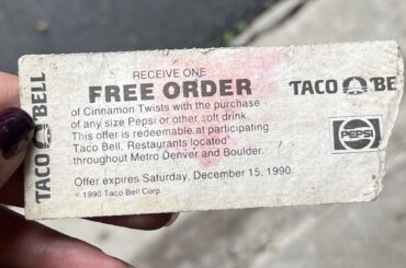 Taco Bell coupon that expired in 1990 on the back of an old event ticket