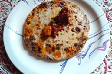 Big Fat Pickled Mango Red Chili on Top of this Stuffed Roti I made