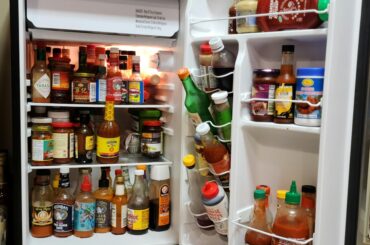 Anyone else have a hot sauce fridge?