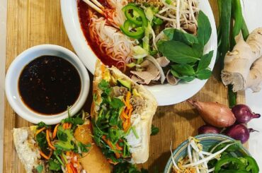 Homemade spicy beef pho and lemongrass grilled pork belly bahn mi