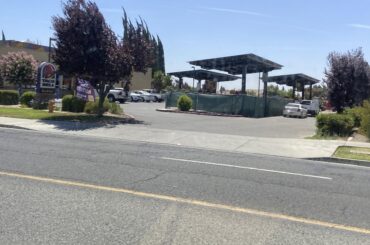 One of my local TB is getting covered parking spaces with solar panels on top.