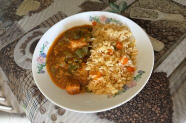 Carne de puerco con nopales en salsa served w/ arroz frito