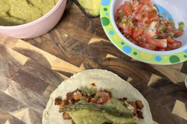 Chorizo potatoes and asparagus taco with homemade corn tortilla and roasted salsa verde
