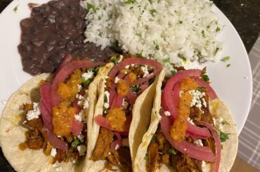 Cochinita pibil, habanero salsa, pickled red onions, and cilantro lime rice.