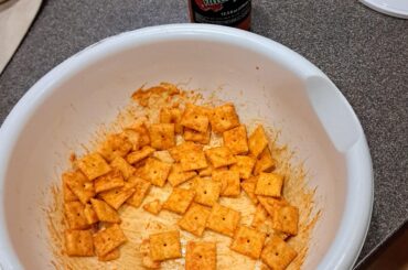 Cheez-its covered in Valentina hot sauce and lime juice