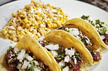 Smoked beef cheek tacos and esquites.