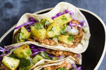 Broiled pork tenderloin tenderized with fresh pineapple makes tacos al pastor a weeknight affair