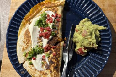 Homemade beef, cheddar and stewe in honey onion quesadilla