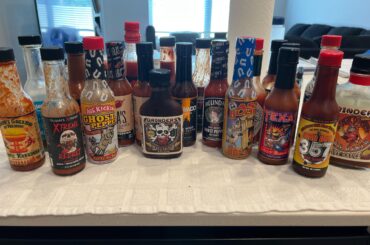 My hot sauces from Texas, Hawaii, Vermont Kansas City & Maine. Hottest front and center. Can anyone top this?